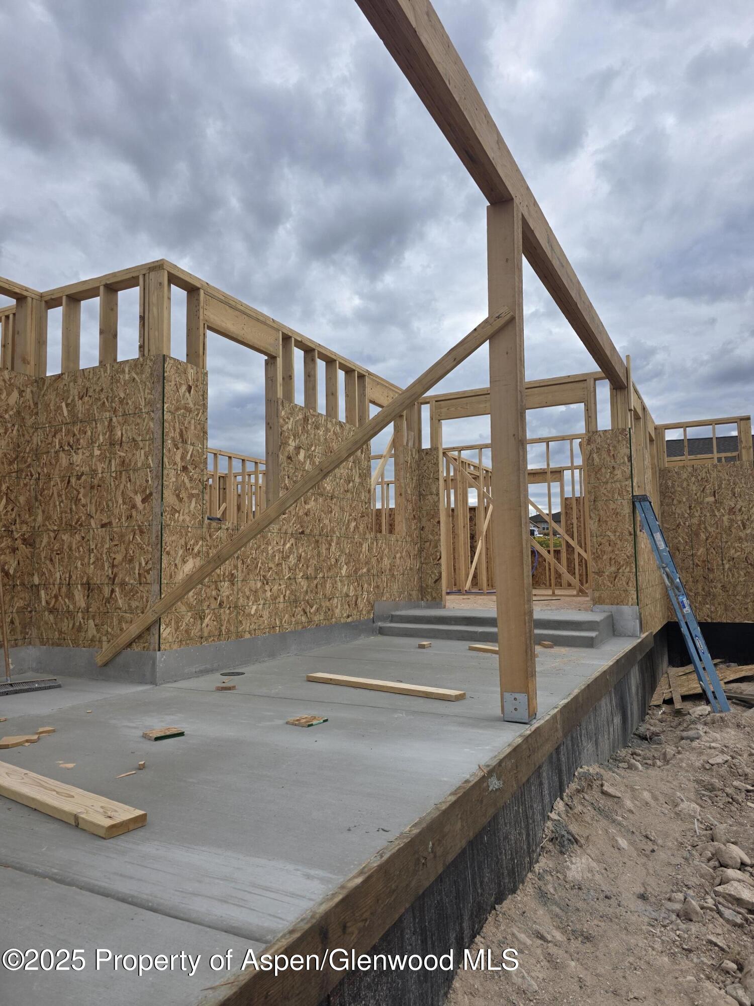 318 Eagle Ridge Drive Parachute, CO 81635 - Photo 8 of 14 a view of staircase with white walls