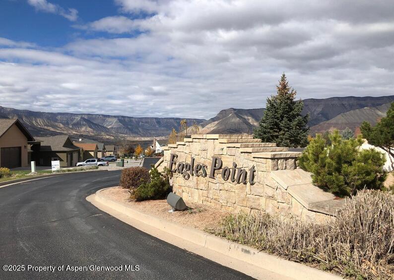 318 Eagle Ridge Drive Parachute, CO 81635 - Photo 10 of 14 a view of a swimming pool with a yard