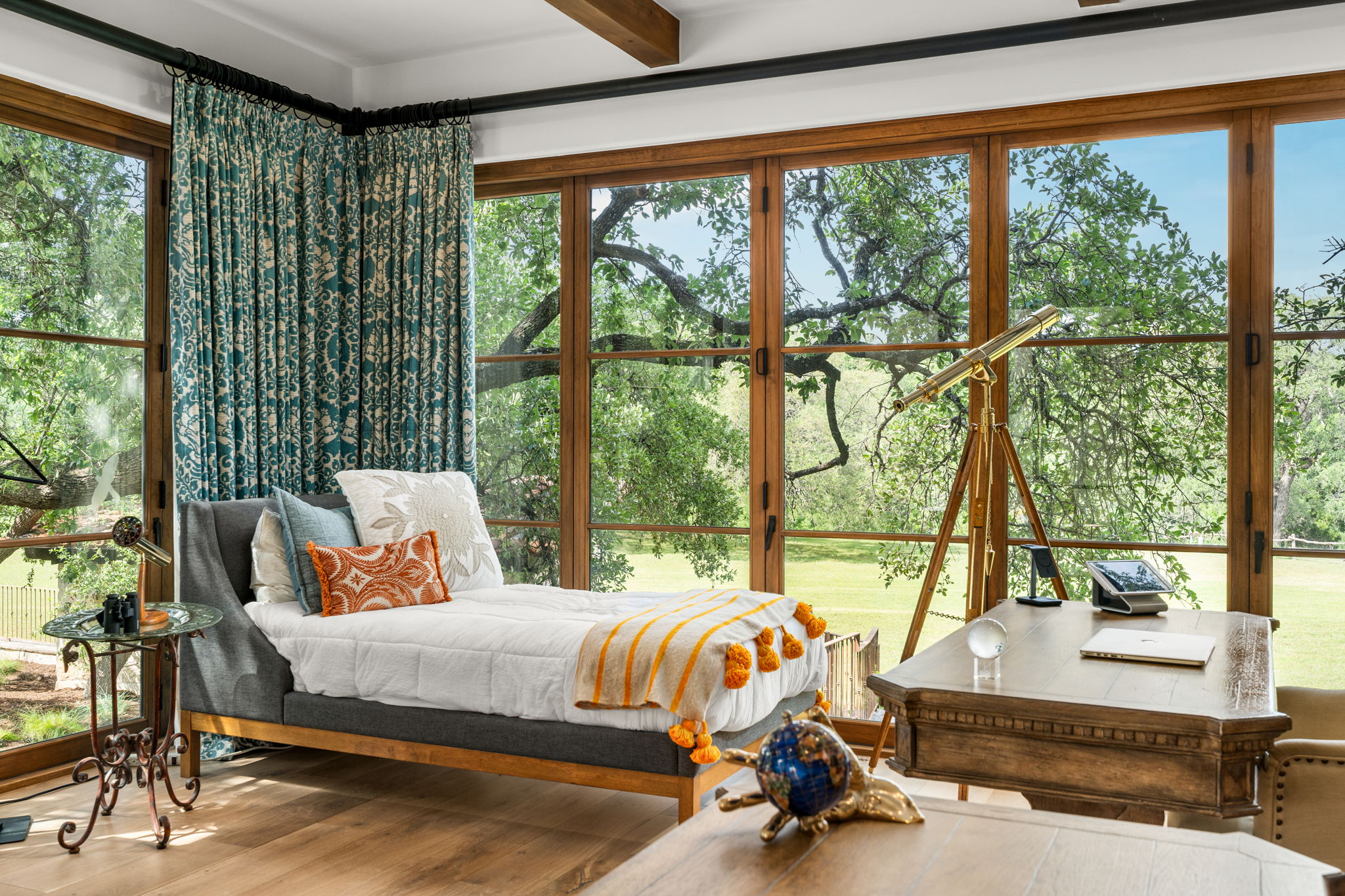 11941 Overlook Pass Austin, TX 78738 - Photo 29 of 40 Guest House featuring walls of accordion glass doors, creating a seamless indoor-outdoor experience