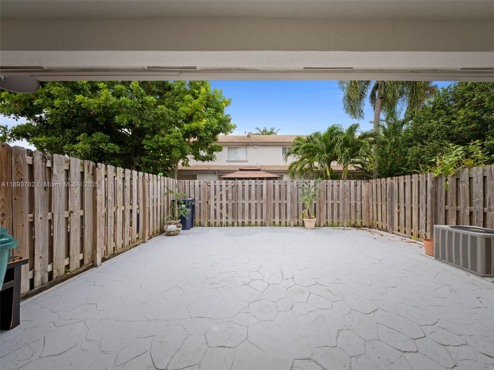 7486 Southwest 162nd Court Miami, FL 33193 - Photo 11 of 47 a view of a fence