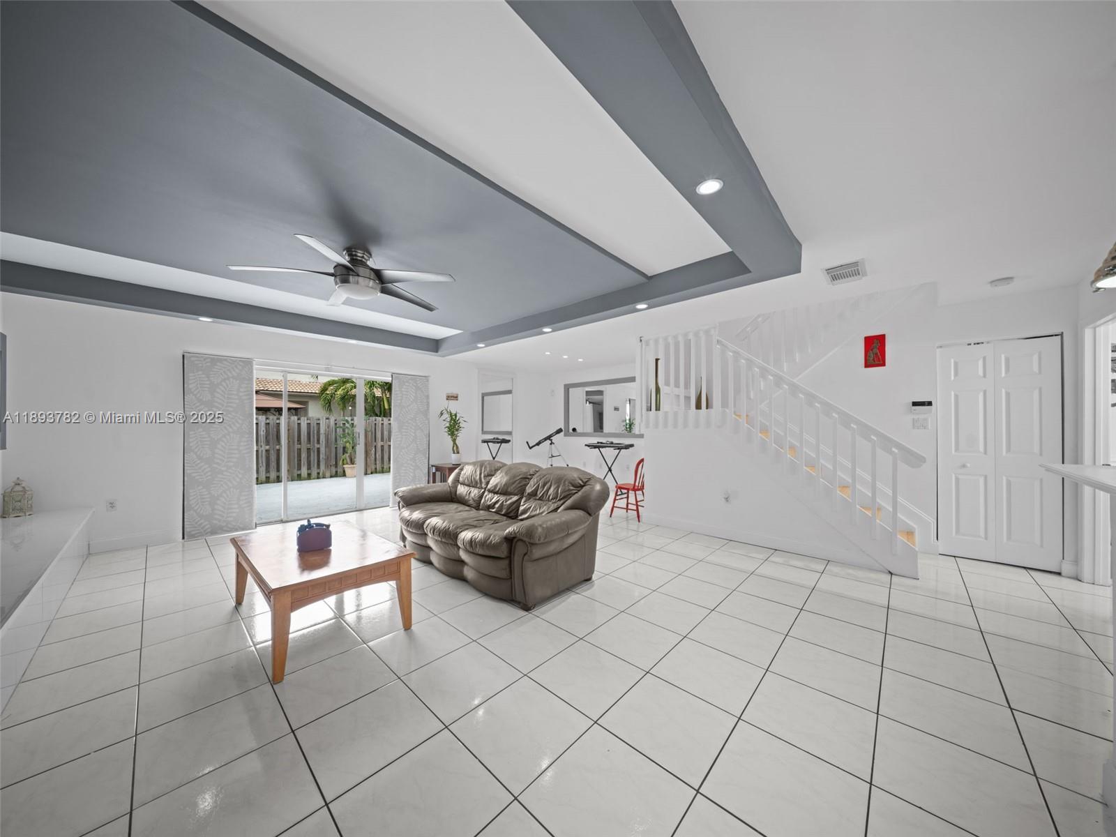 7486 Southwest 162nd Court Miami, FL 33193 - Photo 20 of 47 a living room with furniture