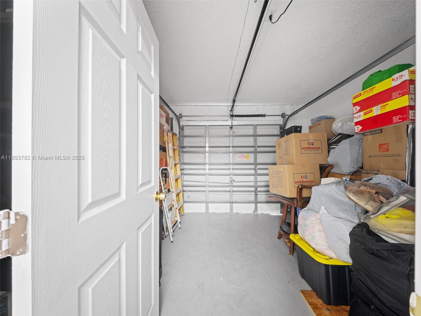7486 Southwest 162nd Court Miami, FL 33193 - Photo 31 of 47 a utility room with dryer and washer