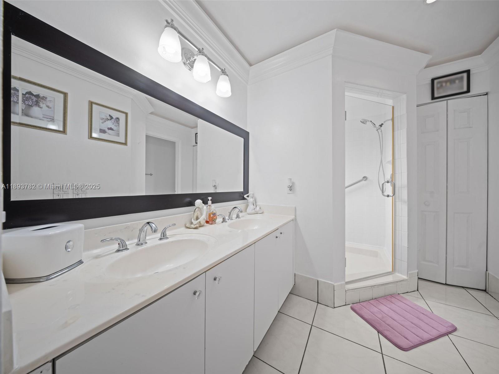 7486 Southwest 162nd Court Miami, FL 33193 - Photo 41 of 47 a bathroom with a sink and a mirror