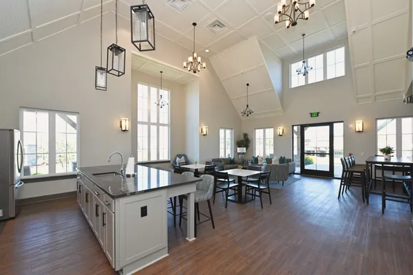 a very nice looking dining room with a large window