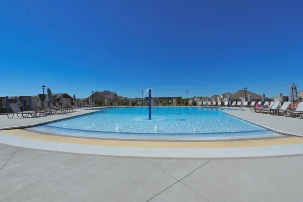 a view of a swimming pool and an ocean