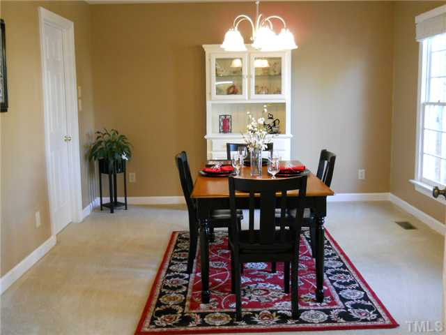 2957 Tillinghast Trail Raleigh, NC 27613 - Photo 5 of 25 Formal dining room to enjoy those holiday dinners with family and friends.