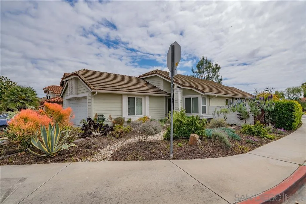4105 Del Mar Trails Road San Diego, CA 92130 - Photo 1 of 1 a front view of a house with garden
