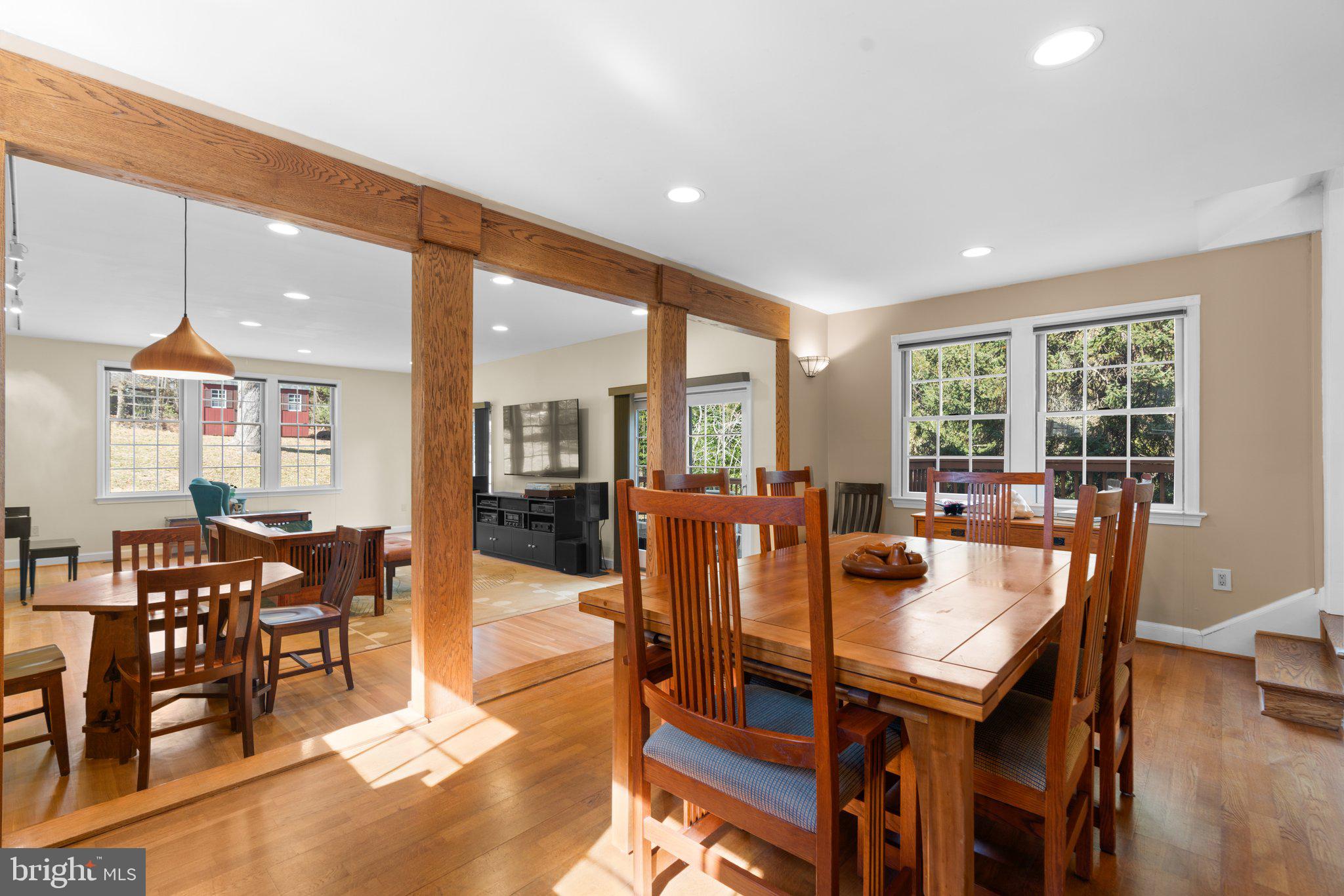 1616 Overlook Drive Silver Spring, MD 20903 - Photo 13 of 69 a dining room with furniture a chandelier and wooden floor