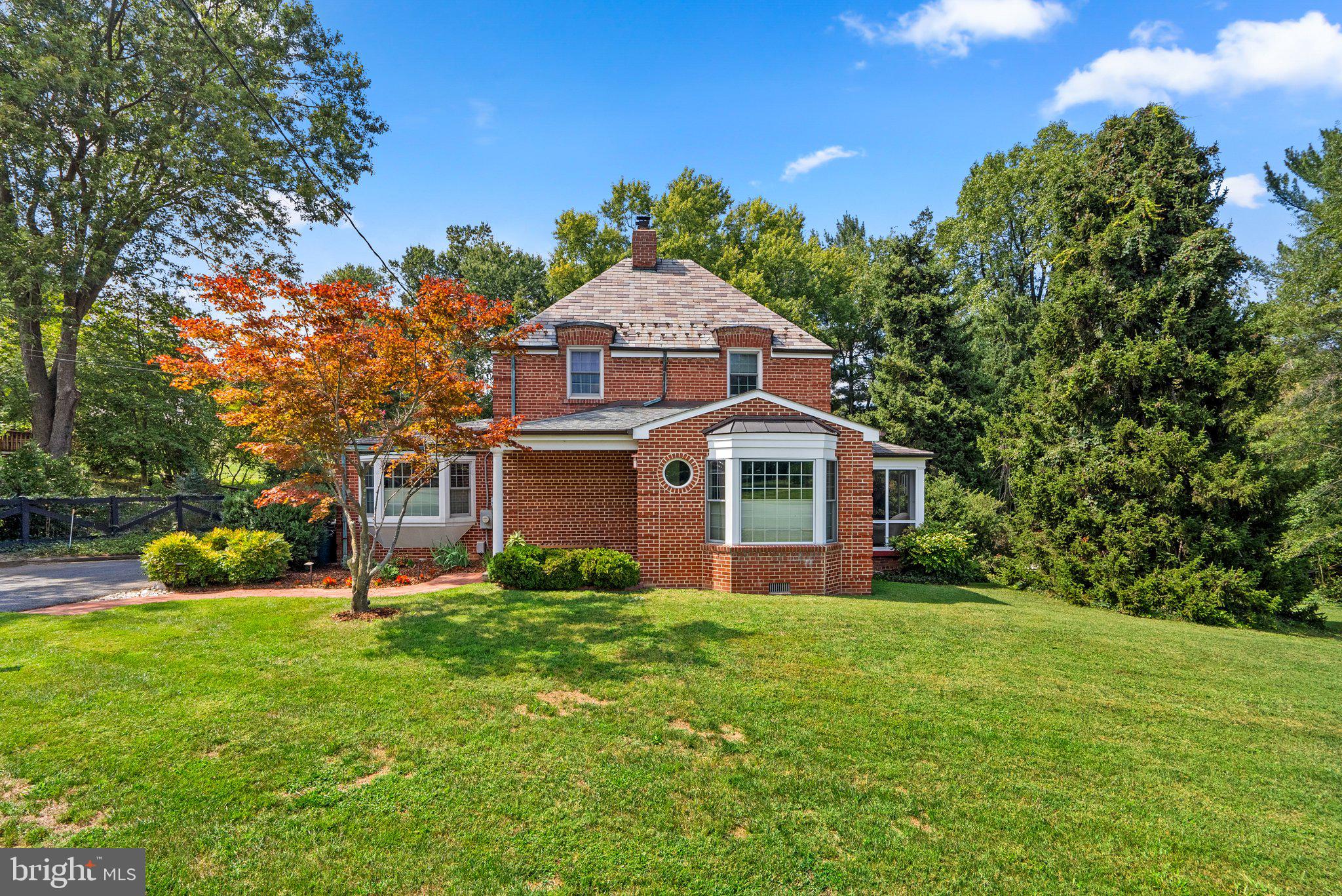 1616 Overlook Drive Silver Spring, MD 20903 - Photo 2 of 69 a front view of a house with garden