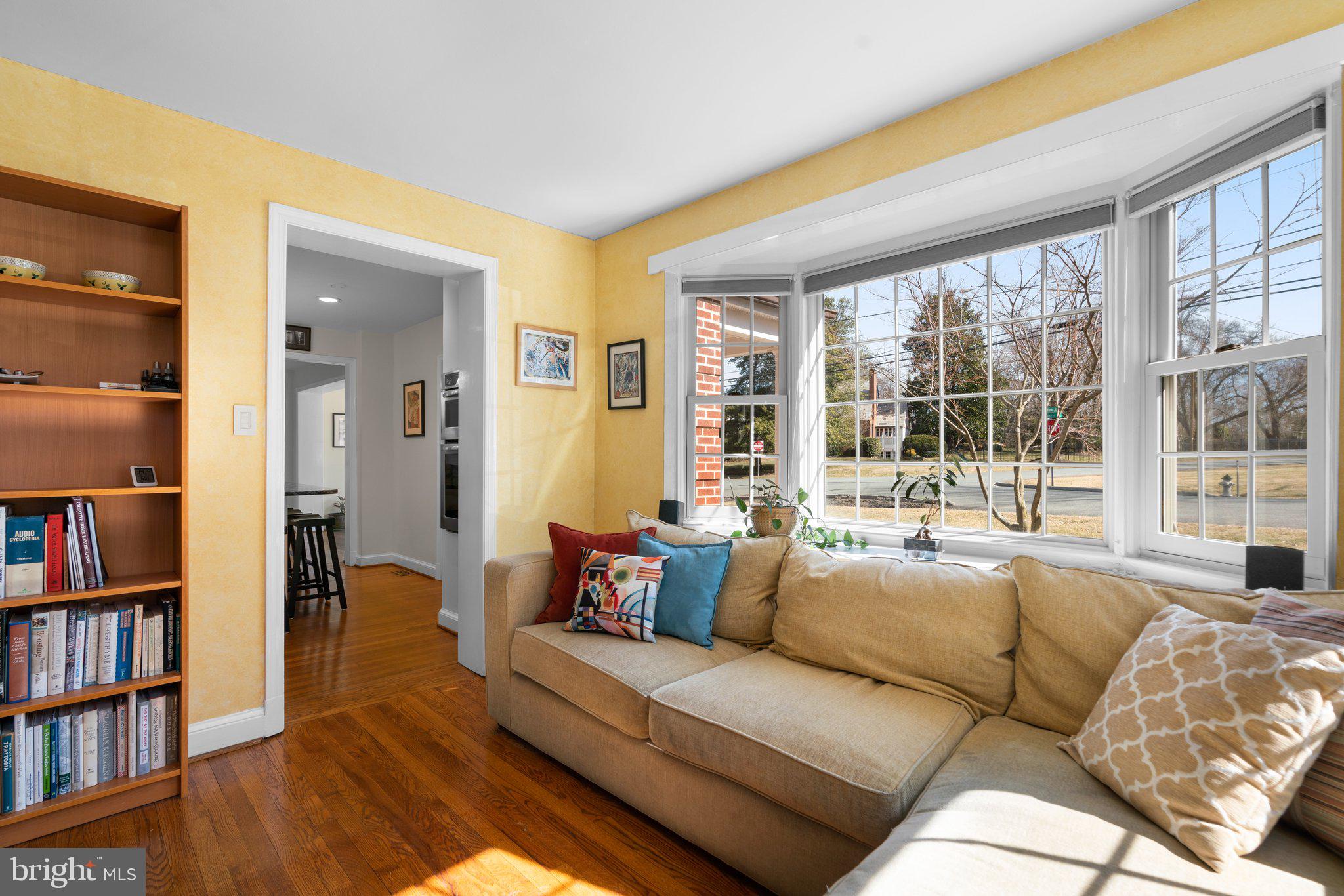 1616 Overlook Drive Silver Spring, MD 20903 - Photo 23 of 69 a living room with furniture and a book shelf