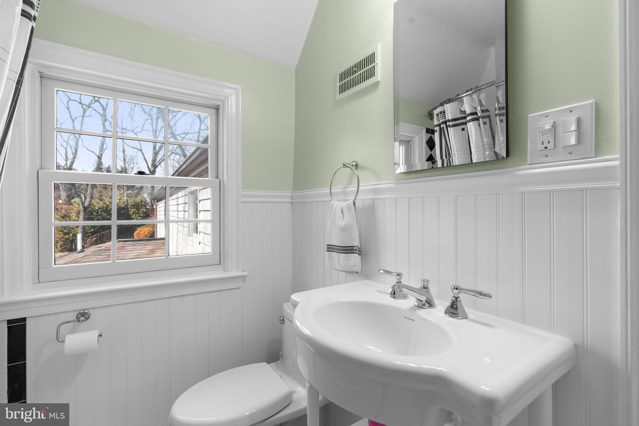 1616 Overlook Drive Silver Spring, MD 20903 - Photo 35 of 69 a bathroom with a sink and a toilet