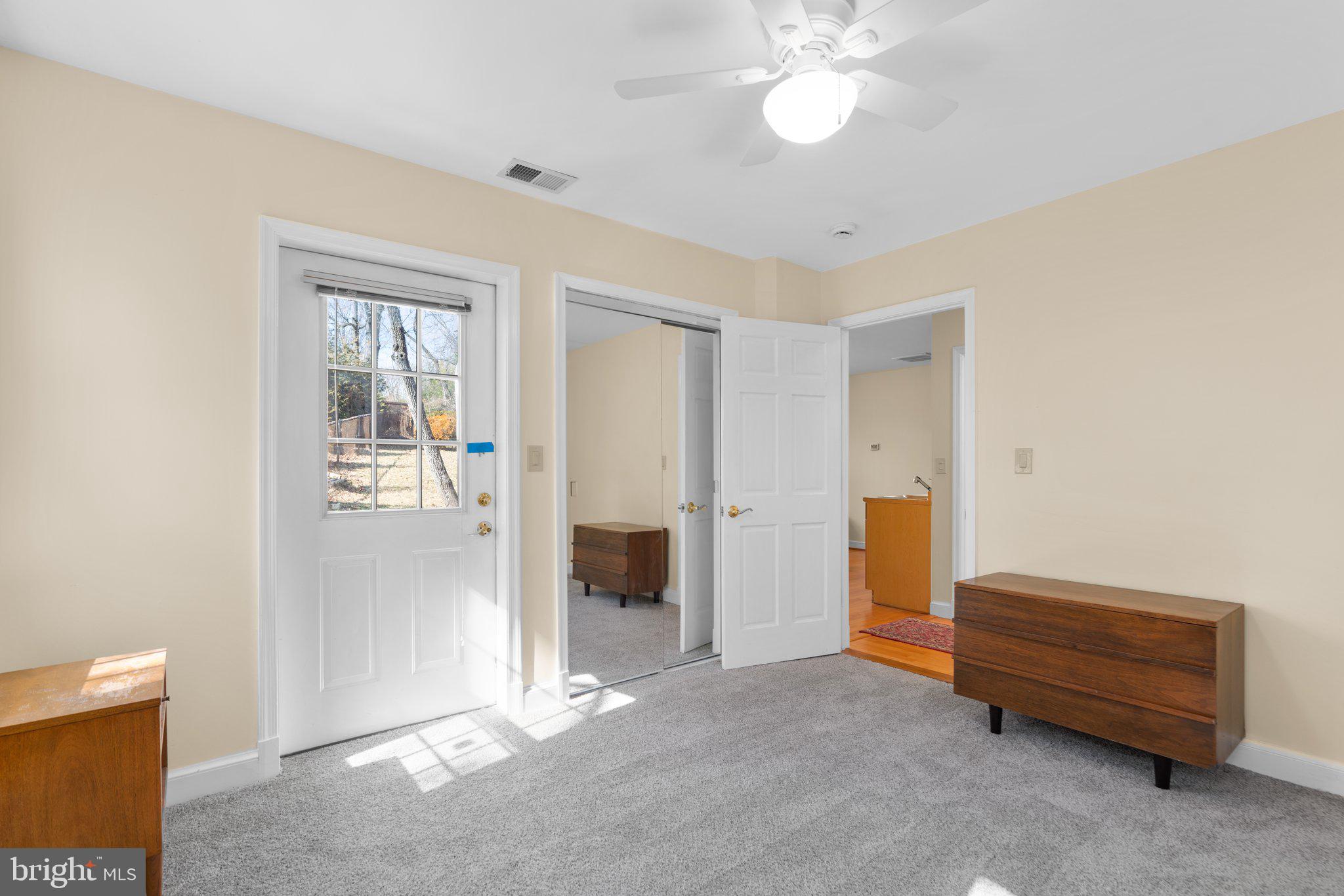 1616 Overlook Drive Silver Spring, MD 20903 - Photo 44 of 69 a view of room with workspace and a ceiling fan