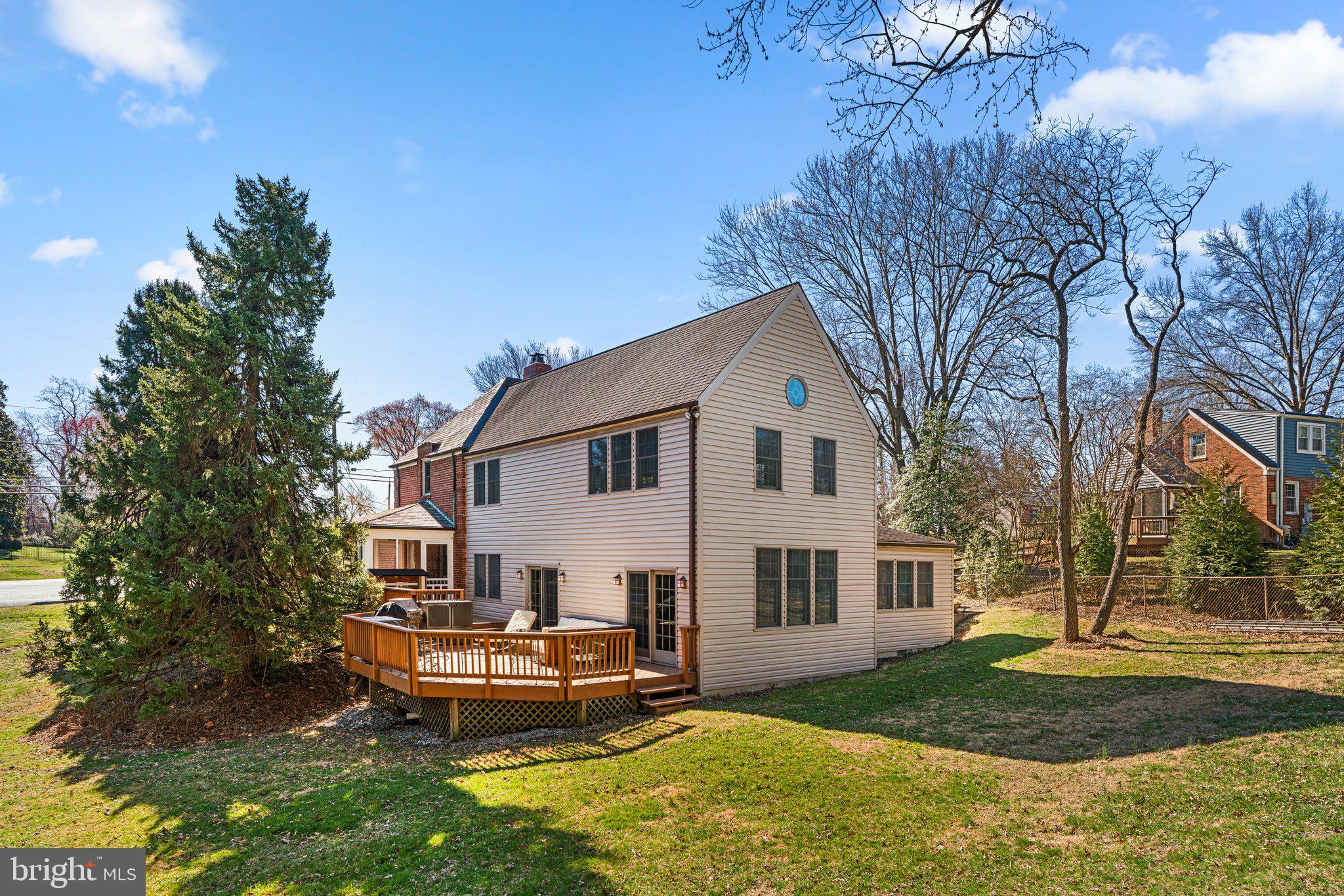 1616 Overlook Drive Silver Spring, MD 20903 - Photo 63 of 69 a view of a white house with a yard