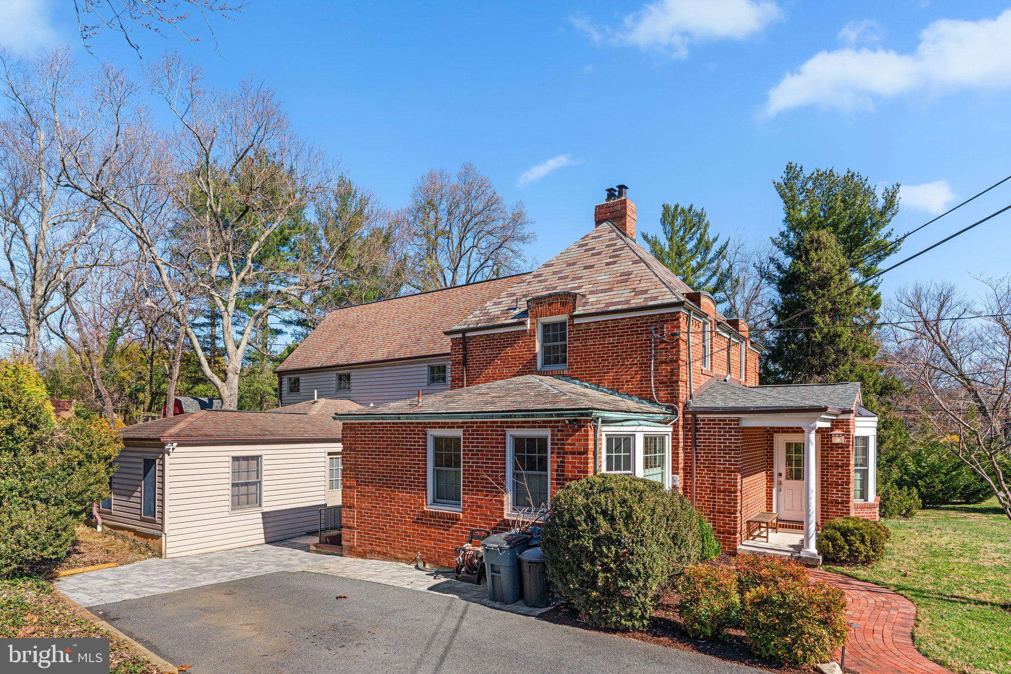 1616 Overlook Drive Silver Spring, MD 20903 - Photo 7 of 69 a front view of a house with a yard