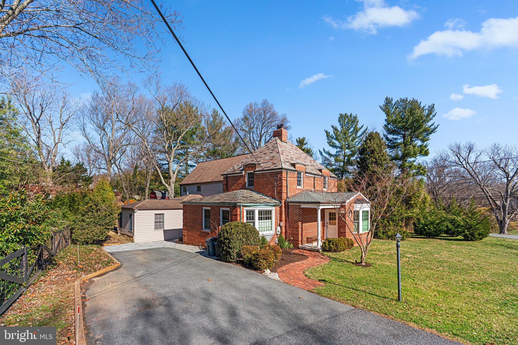 1616 Overlook Drive Silver Spring, MD 20903 - Photo 8 of 69 a front view of a house with a yard
