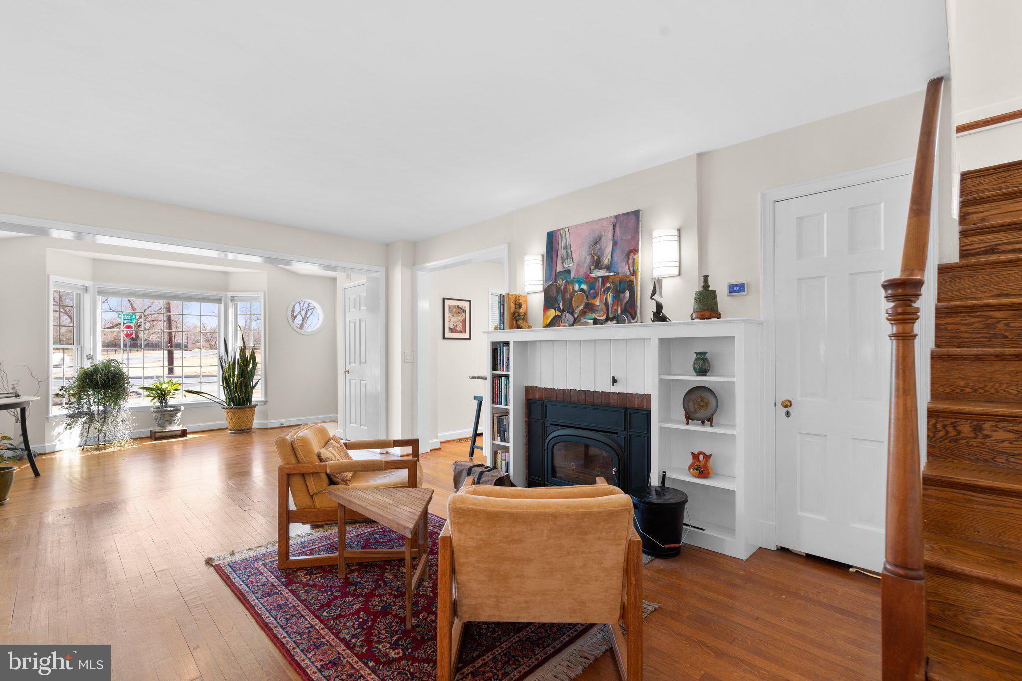 1616 Overlook Drive Silver Spring, MD 20903 - Photo 9 of 69 a living room with furniture and a fireplace