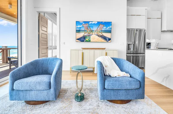 a bathroom with a double vanity sink a mirror and a shower