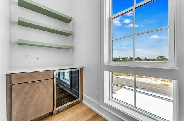 a view of front door with wooden floor