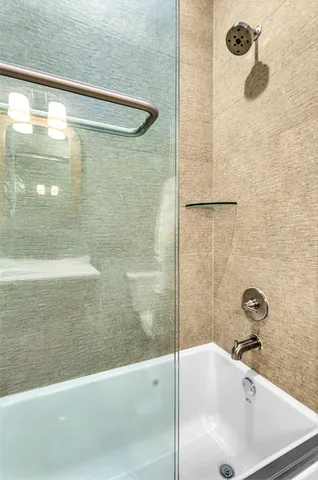 a bathroom with a bathtub