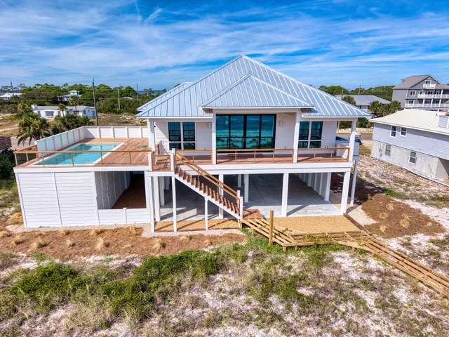 a view of a house with roof deck