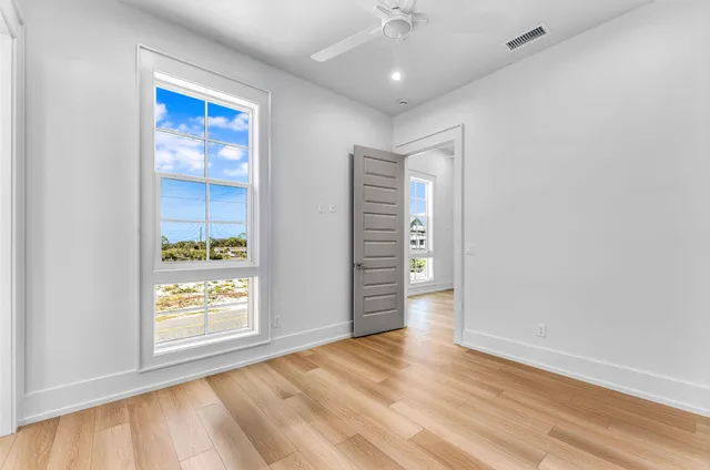 a bathroom with a sink a toilet and a shower