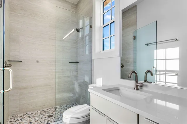 a view of a glass door and the balcony