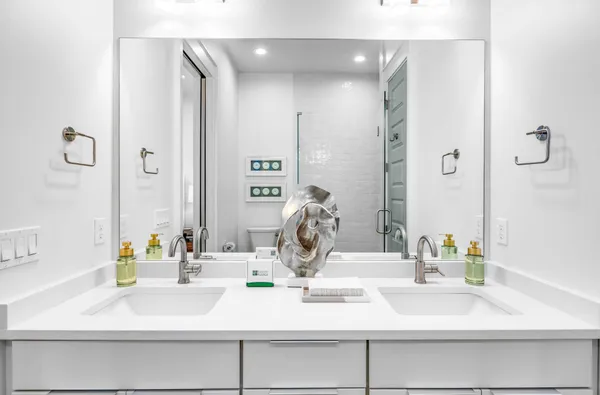 a view of a porch with furniture and floor to ceiling window