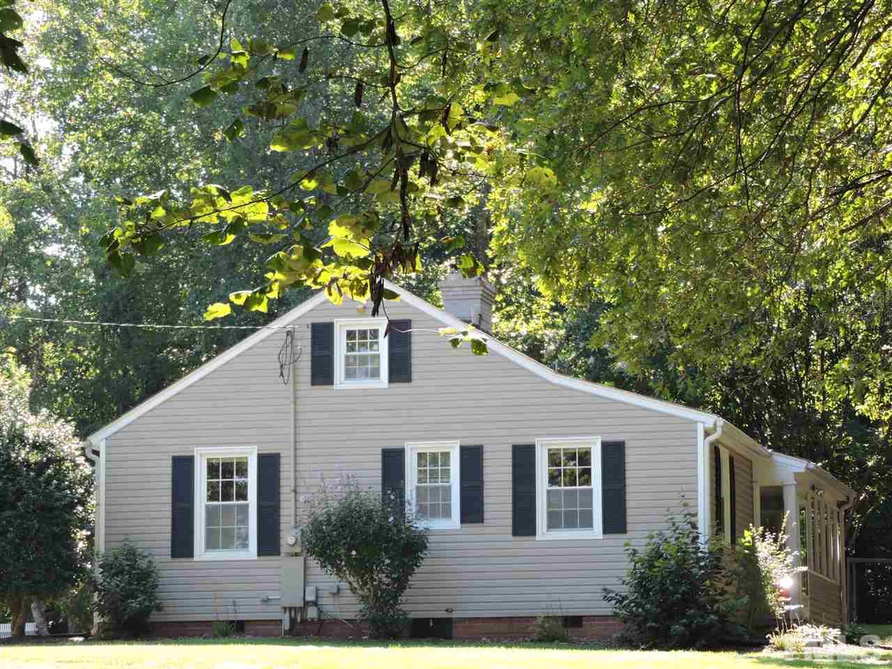 10819 North Roxboro Road Rougemont, NC 27572 - Photo 11 of 19 a front view of a house with a yard