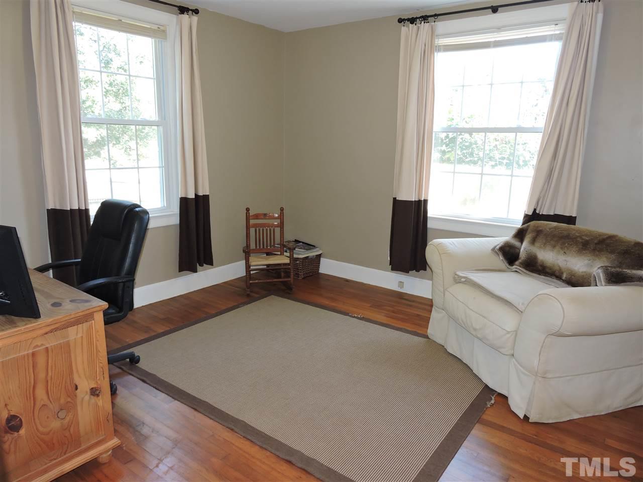 10819 North Roxboro Road Rougemont, NC 27572 - Photo 9 of 19 a living room with furniture and a window