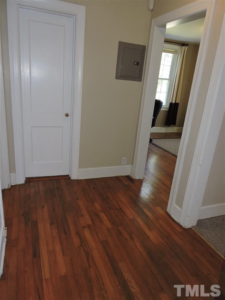 10819 North Roxboro Road Rougemont, NC 27572 - Photo 10 of 19 a view of empty room with wooden floor
