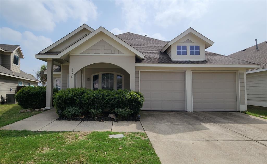 9775 Old Field Drive McKinney, TX 75072 - Photo 1 of 1 a front view of a house with a garden