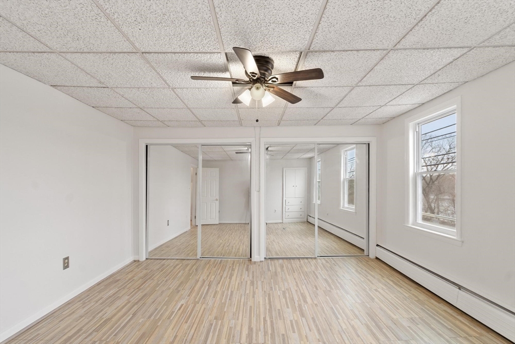 524 Merrimack Street Methuen, MA 01844 - Photo 19 of 42 a view of an empty room with a window