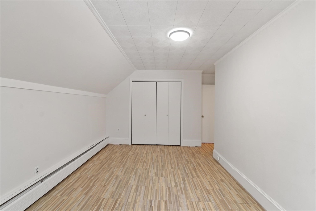 524 Merrimack Street Methuen, MA 01844 - Photo 22 of 42 a view of room with wooden floor