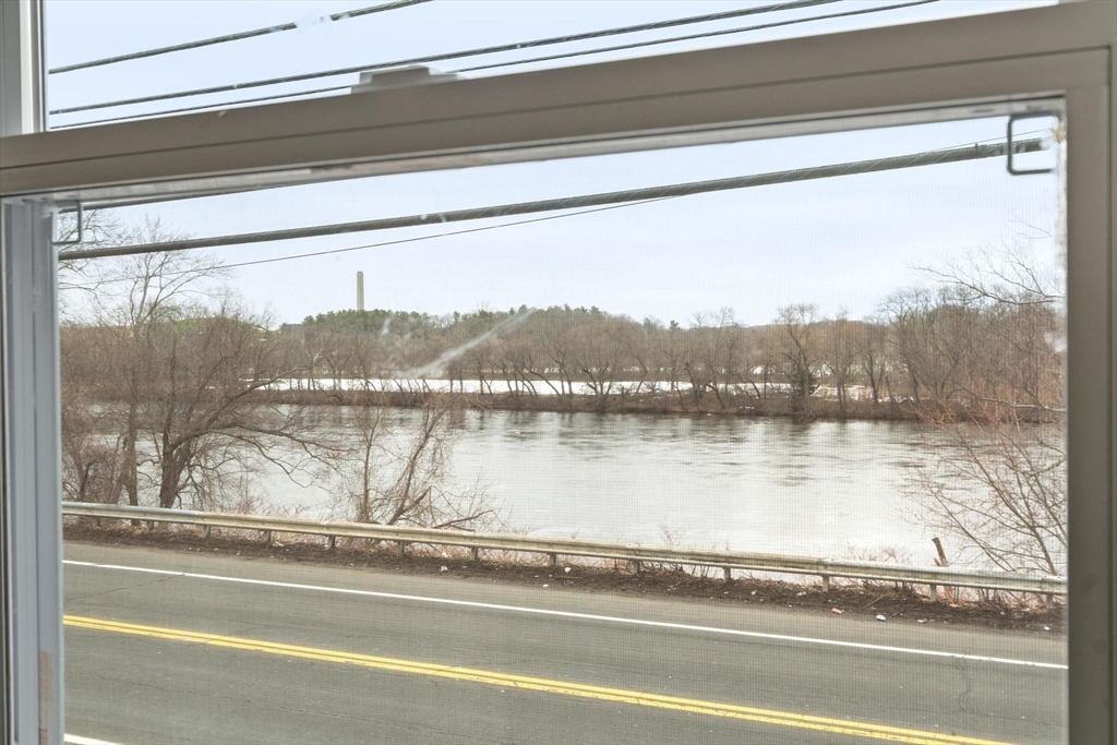 524 Merrimack Street Methuen, MA 01844 - Photo 32 of 42 a view of a living room and a window