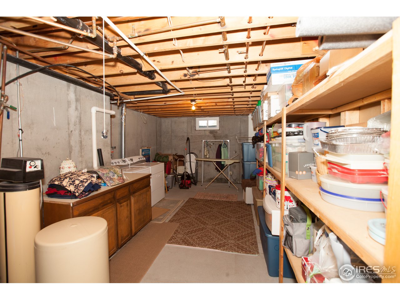 628 Kiwi Road Sterling, CO 80751 - Photo 33 of 35 Laundry/ Storage