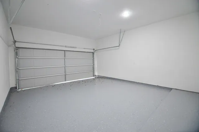 an empty room with a empty space and empty shelves