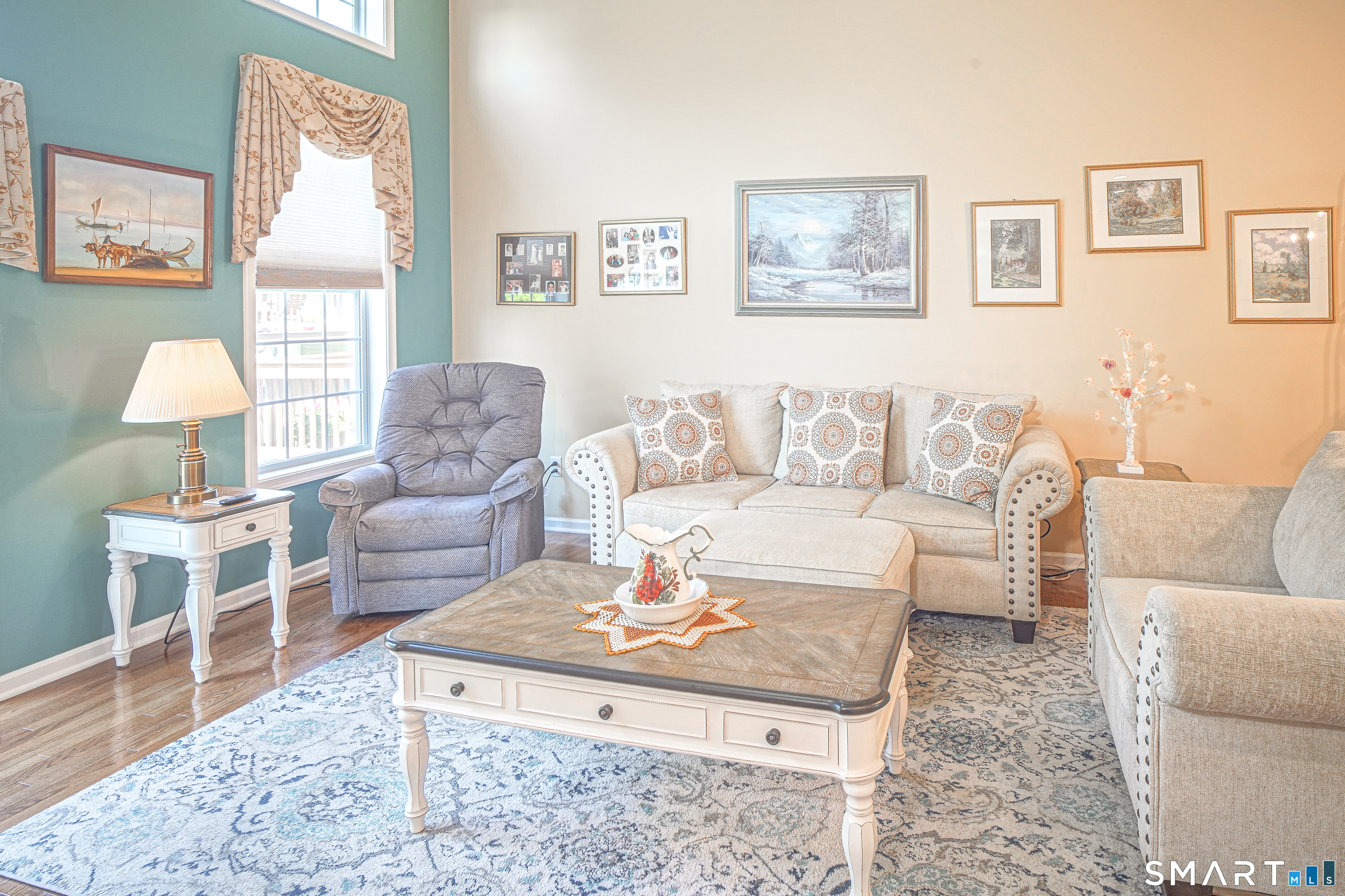 6 Lilac Lane, Unit 6 Prospect, CT 06712 - Photo 14 of 40 Bright main living room wiht hardwood floors and high ceiling