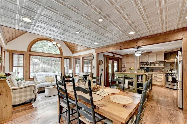 a bedroom with furniture and wooden floor