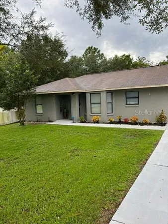 a front view of house with yard