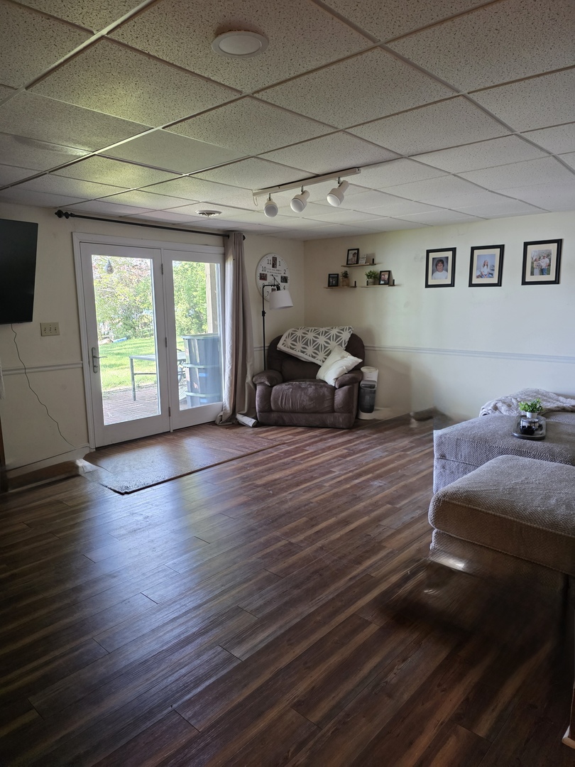 107 Comanche Trail Loda, IL 60948 - Photo 23 of 37 a bedroom with furniture and wooden floor