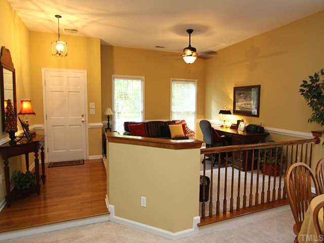 8705 Walkelin Court Raleigh, NC 27615 - Photo 4 of 12 The formal living room is just off the entry and has lots of natural light, a ceiling fan, and is open to the rest of the house.