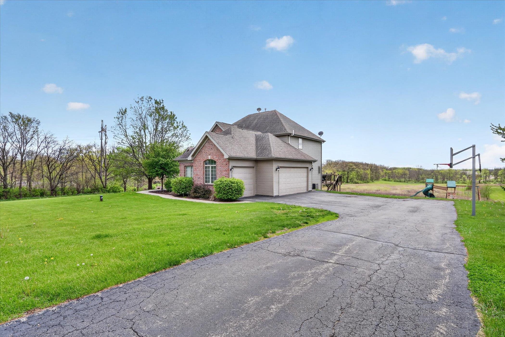 6957 East Wildwood Road Stillman Valley, IL 61084 - Photo 3 of 57
