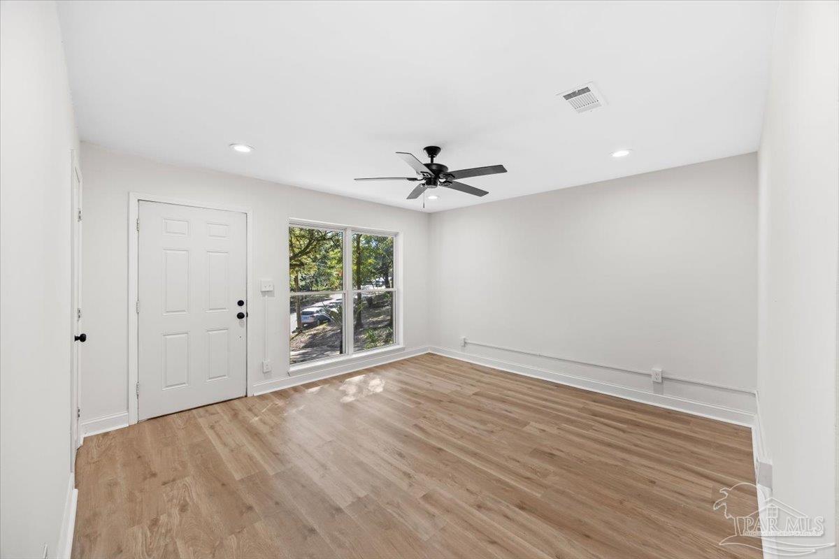 5149 Crestwood Road Pensacola, FL 32503 - Photo 15 of 53 a view of an empty room with a window