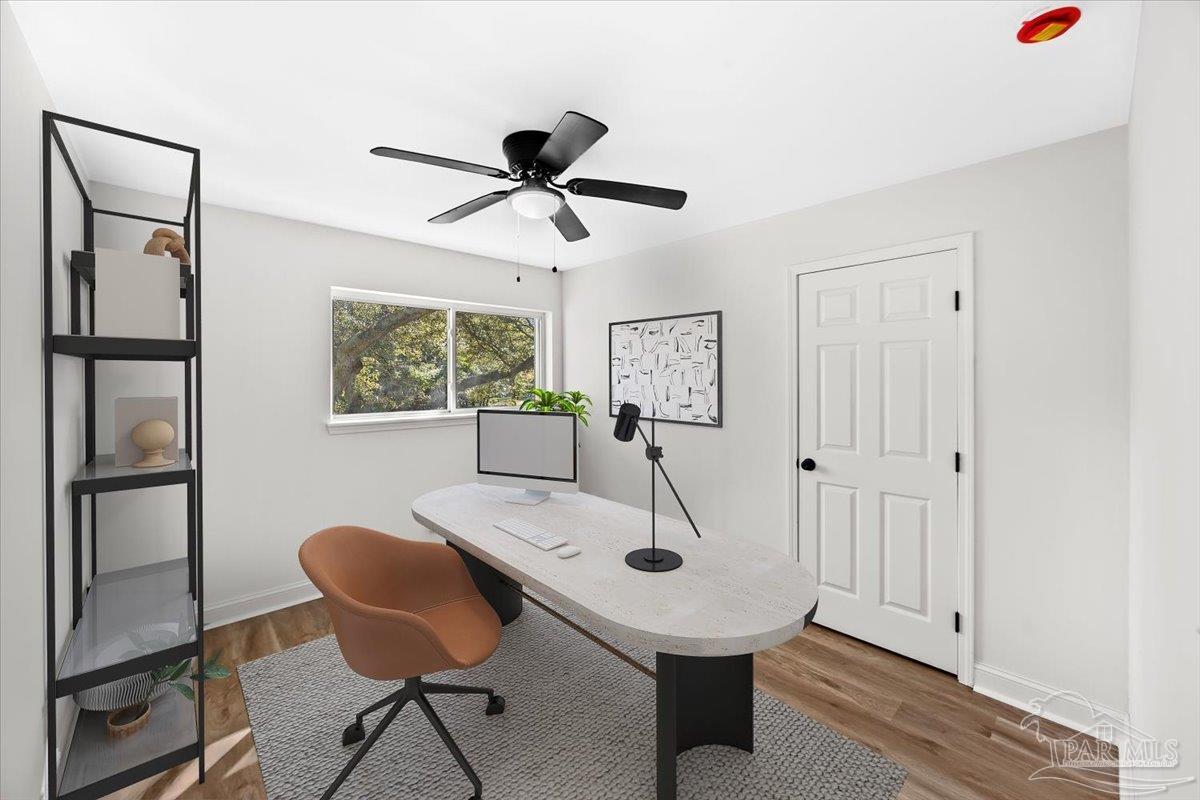 5149 Crestwood Road Pensacola, FL 32503 - Photo 26 of 53 a view of a room with furniture and a window