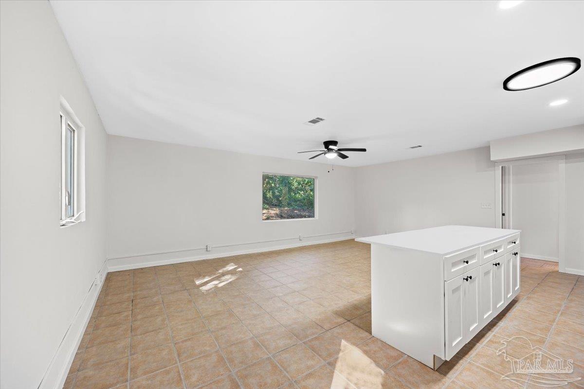 5149 Crestwood Road Pensacola, FL 32503 - Photo 32 of 53 a view of a kitchen cabinets a sink and dishwasher in a kitchen