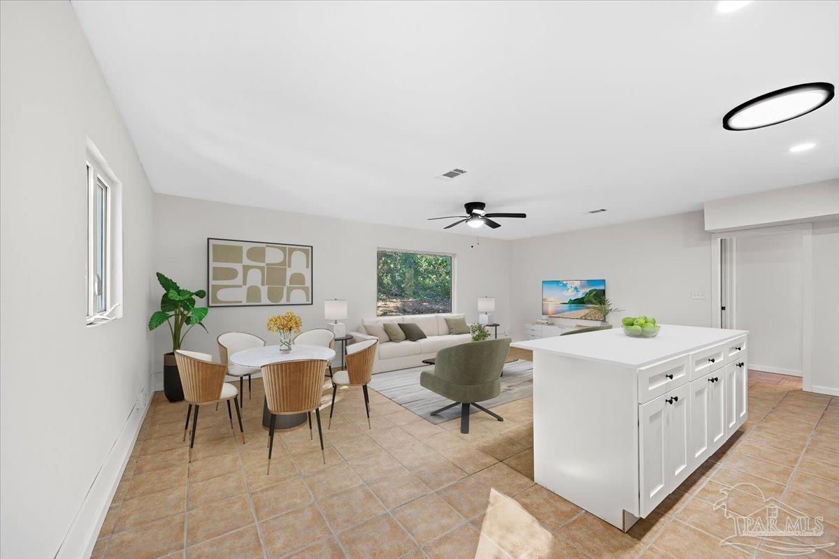 5149 Crestwood Road Pensacola, FL 32503 - Photo 34 of 53 a living room with a couch and a window