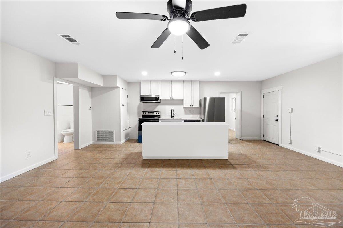 5149 Crestwood Road Pensacola, FL 32503 - Photo 35 of 53 a view of a kitchen with an empty space