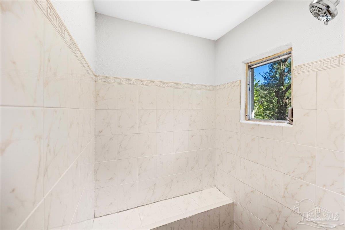 5149 Crestwood Road Pensacola, FL 32503 - Photo 39 of 53 a bathroom with a shower