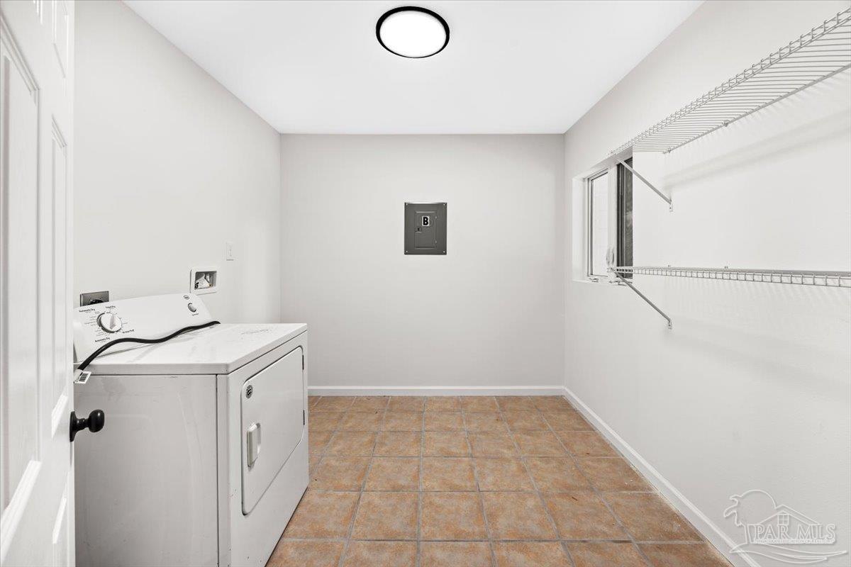 5149 Crestwood Road Pensacola, FL 32503 - Photo 41 of 53 a bathroom with a sink and a mirror