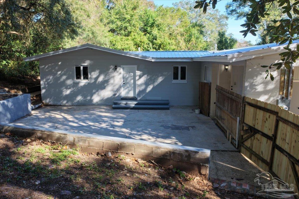 5149 Crestwood Road Pensacola, FL 32503 - Photo 49 of 53 a house with trees in the background